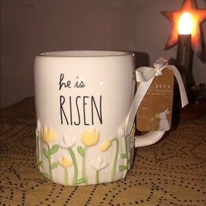 Rae Dunn HE IS RISEN Mug Raised Flowers Around Base